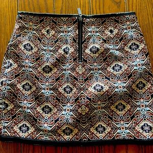 Express skirt with faux leather trim size 4. Worn once.